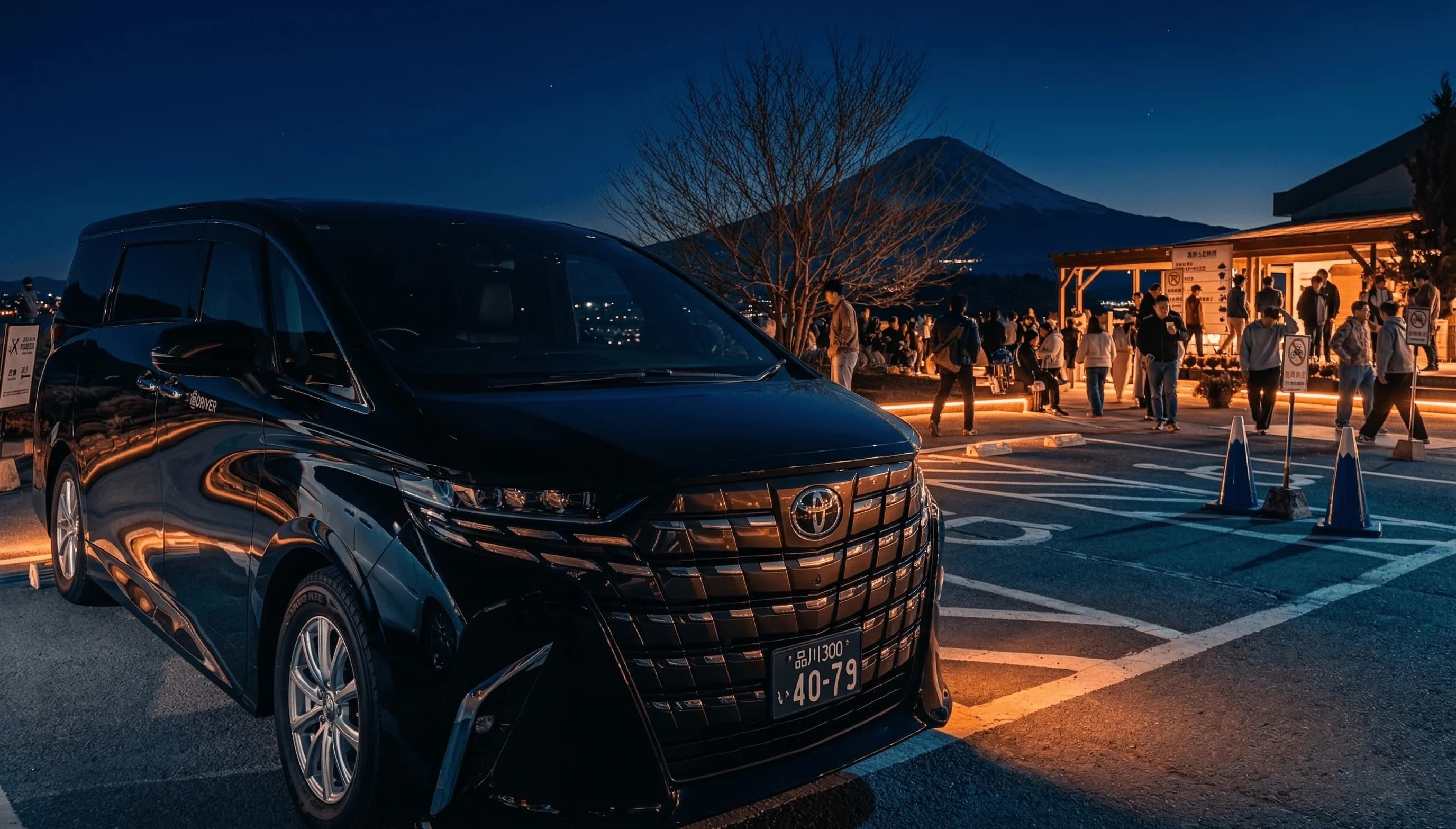 Chauffeur vehicle with Mount Fuji on the horizon